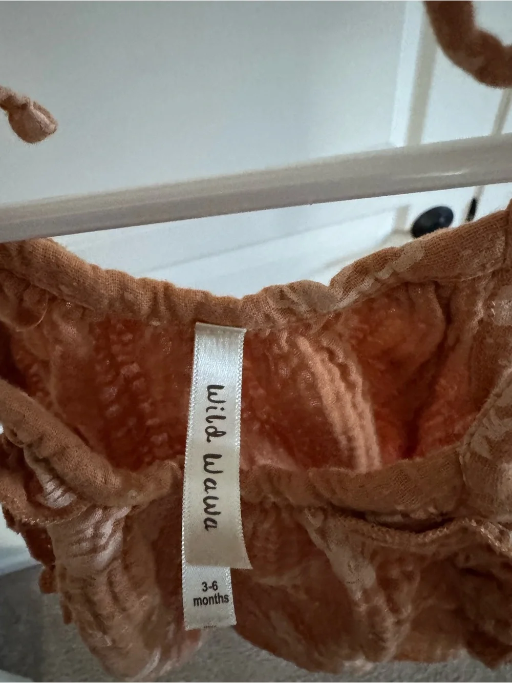 Wild Wawa Rust Baby Romper with Floral Texture